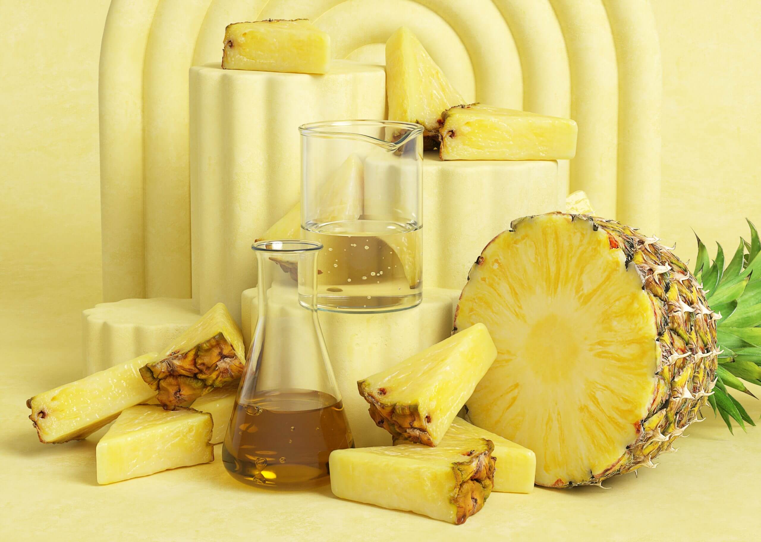 Where science meets nature: Active Serums Pineapple extract and fruit water in laboratory glassware surrounded by fresh fruit.