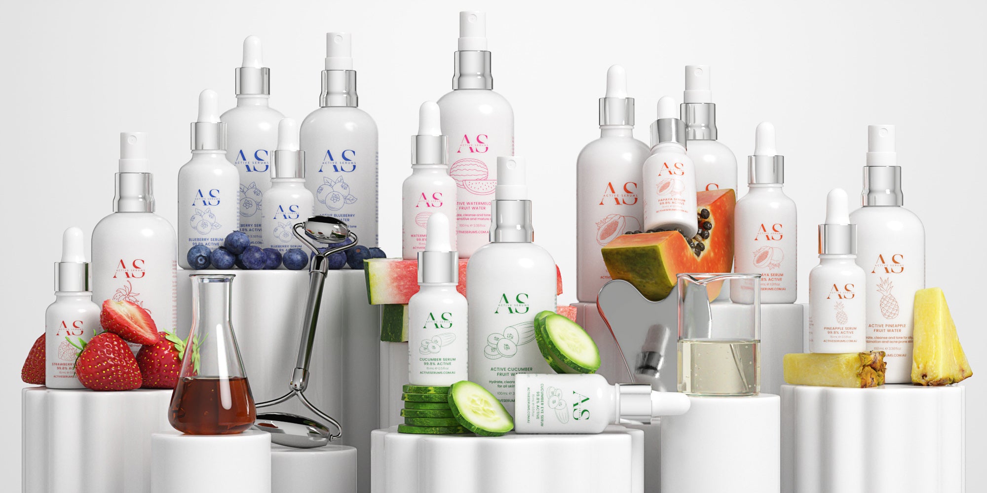 Complete Active Serums range: 15ml, 30ml and 100ml skincare bottles featuring strawberry, papaya, pineapple, blueberry, cucumber, and watermelon.