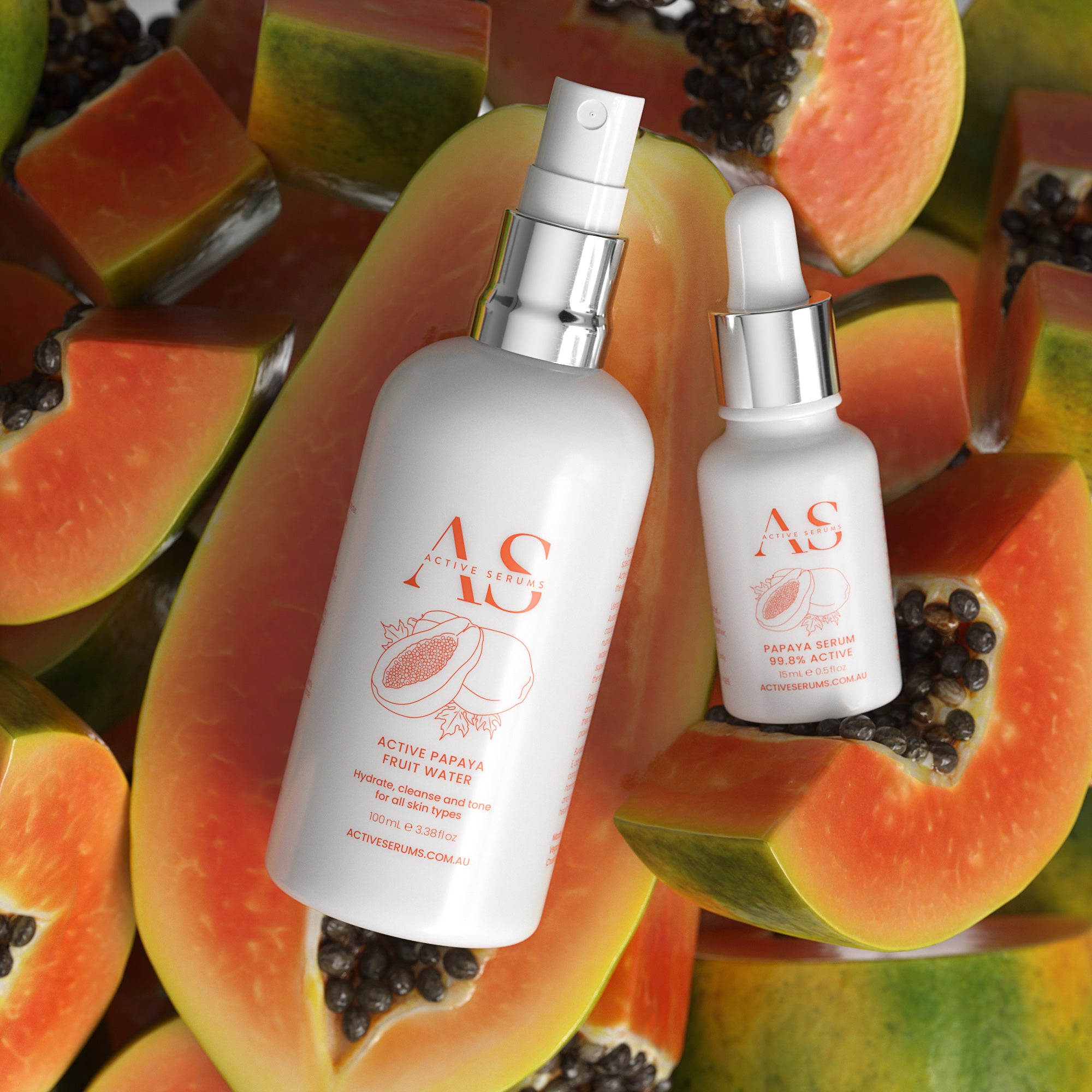 Active Serums papaya skincare bottles on fresh papaya fruit, Australian-made hydrating serum