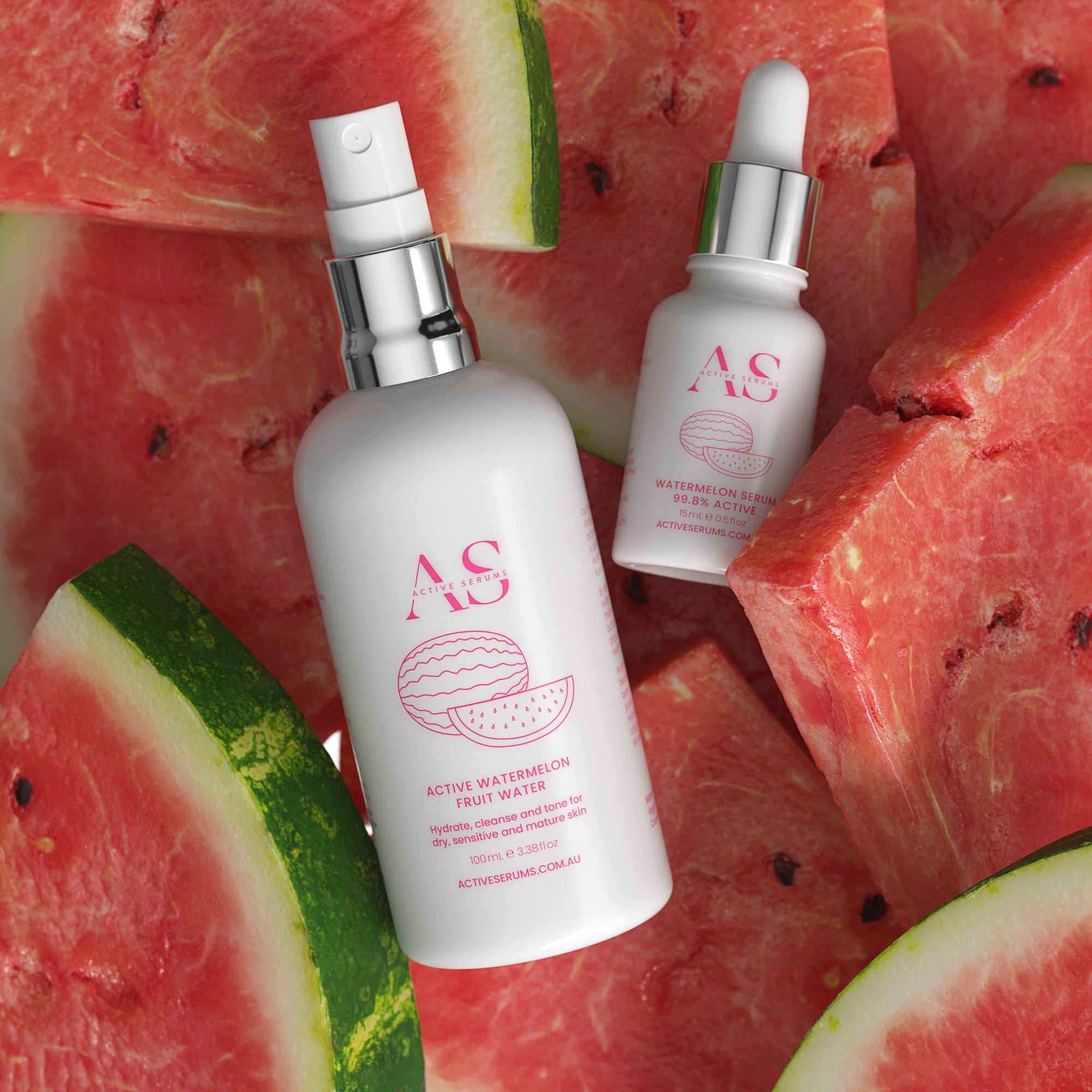 Active Serums watermelon fruit water and serum bottles with watermelon slices background