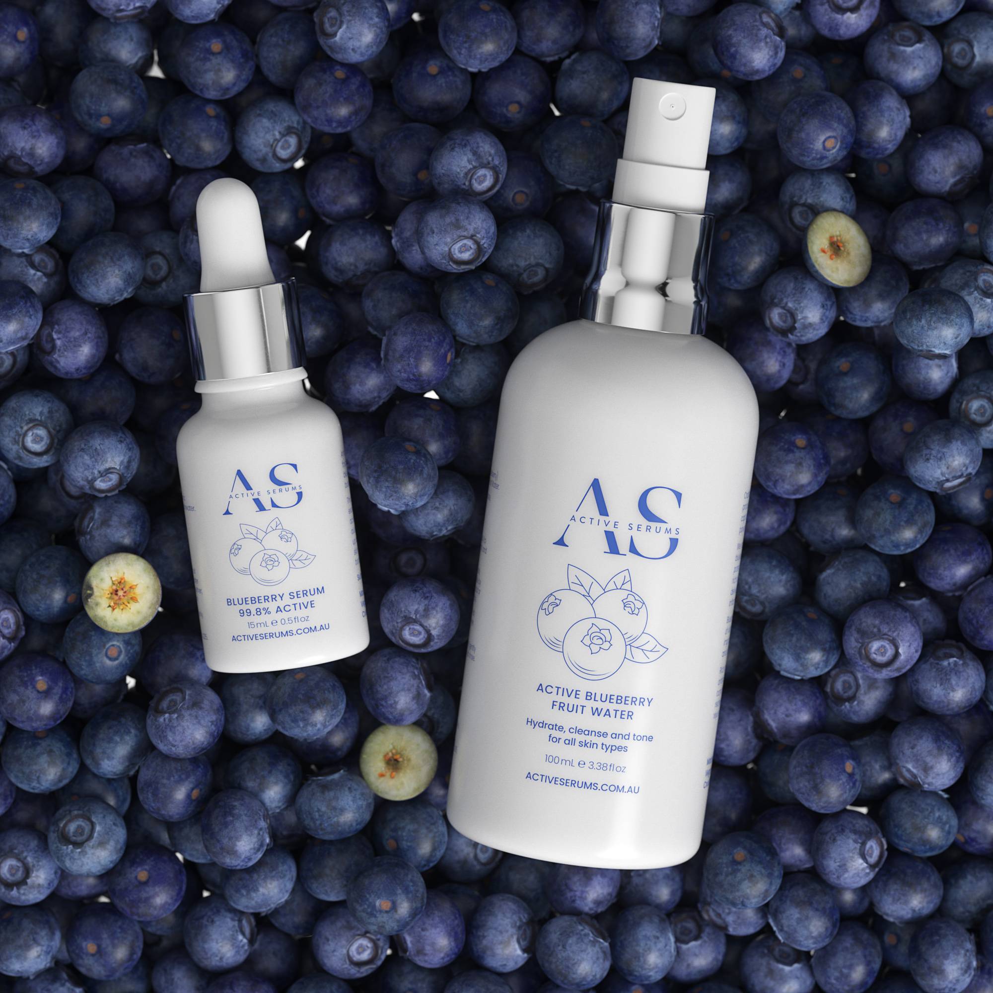 Active Serums blueberry serum and fruit water bottles on fresh blueberries, skincare product flatlay