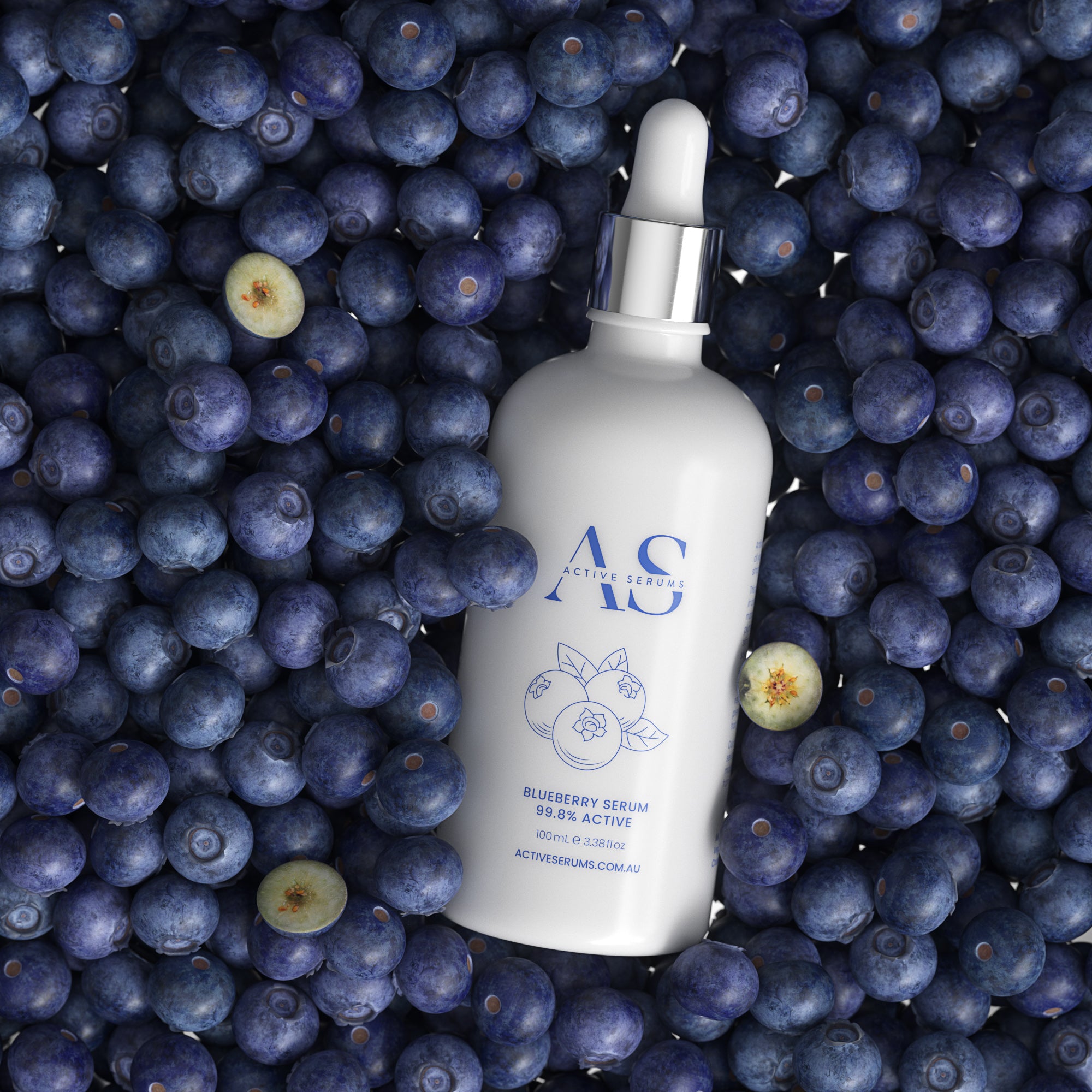 Active Serums 100ml Blueberry Serum bottle nestled in a flatlay of fresh, whole blueberries.