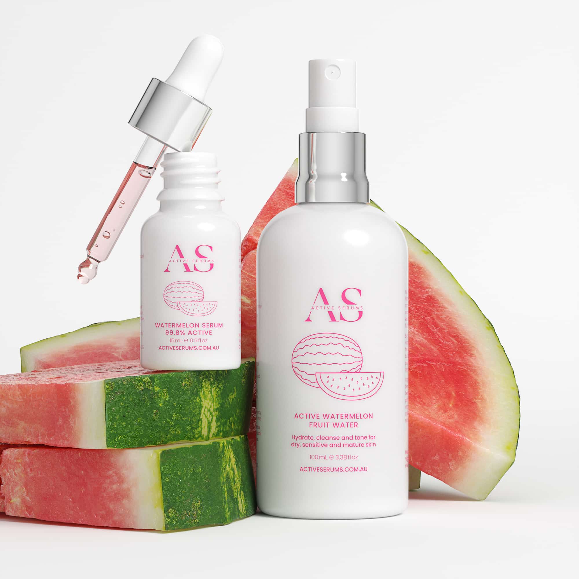 Active Serums watermelon serum and fruit water bottles with fresh watermelon slices