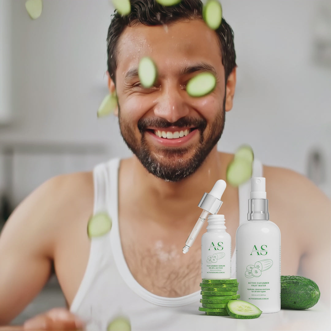 Active Cucumber Duo skincare set with a man splashing his face with refreshing sliced cucumber-infused water.